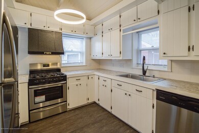 5927 Coulson Ct, Lansing, MI 48911 - photo 2