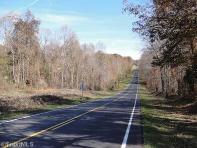 Exterior Front. Street Scene on Huffine Mill Road looking easterly.