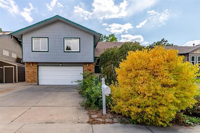 Charming curb appeal with mature landscaping.