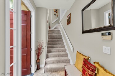 Stairway featuring tile patterned flooring