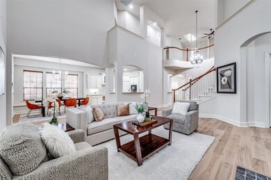 Windows and neutral colors make this space calm, o