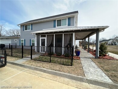 Side with Large Front Porch and Side Metal Fence