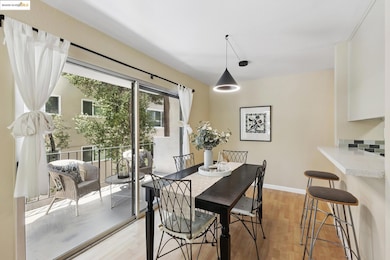 Dining area featuring light wood finished floors and baseboards