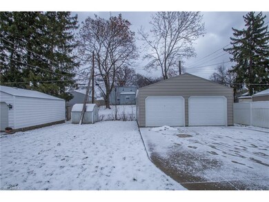 Garage offers 2 new garage doors and openers.  Out