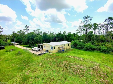 View from above of property featuring a forest