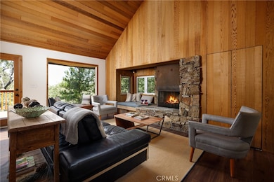 Soft cedar walls and ceiling plus that fireplace, cozy nook and window...so relaxing.