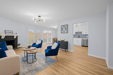 Spacious living room with a neutral color palette,