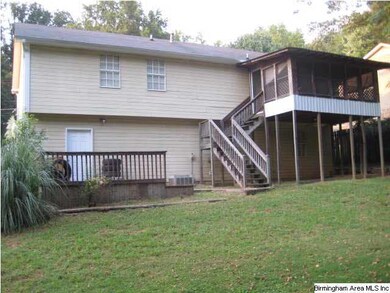 Back view of the Home showing the  enormous Backya