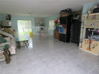First floor has sliders, fireplace, storage closet