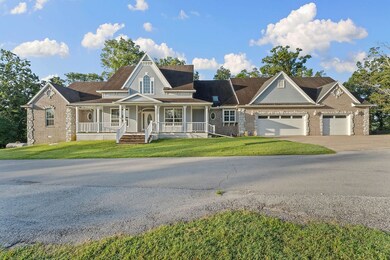 4 car garage with extended driveway for RV parking