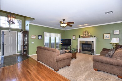 Front door shown at left.  kitchen & dining is off