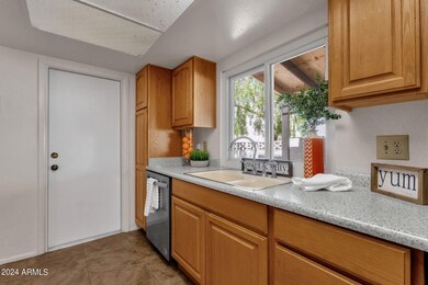 Attached garage entrance from kitchen