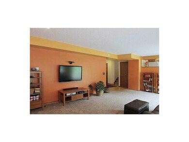 Family Room-L1. Brand new carpet in family room