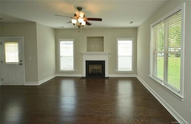 gas fireplace in great room . New wood floors
