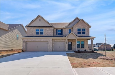 Craftsman-style house featuring a garage