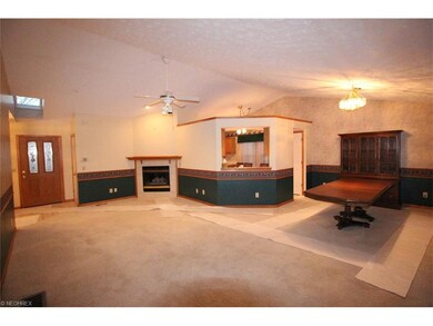 View of foyer, great room, dining and kitchen pass