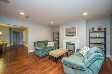 The large living room features an eye-catching dec