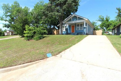 View of front of home featuring driveway and a fro