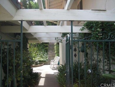 Gated front entry to courtyard