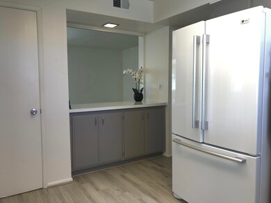 Kitchen Refrig and Breakfast Bar