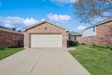 View of front of property featuring a front yard a