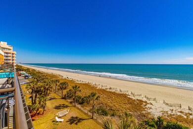 Property view of water with a beach view