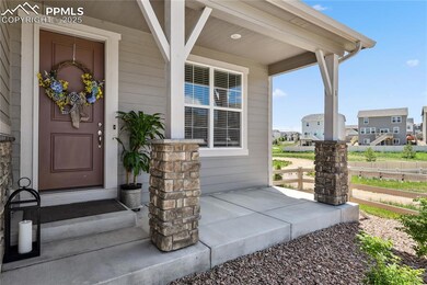 Property entrance featuring covered porch and a residential view