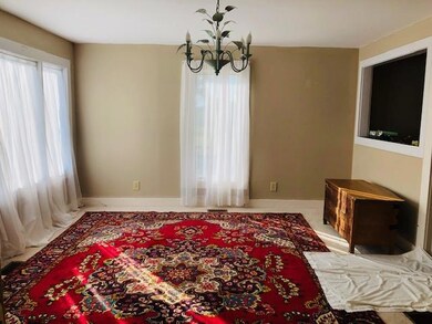 Very spacious living area with lots of natural lighting 