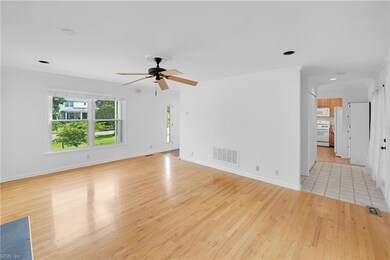 Gleaming hardwood floors grace the entire main level.