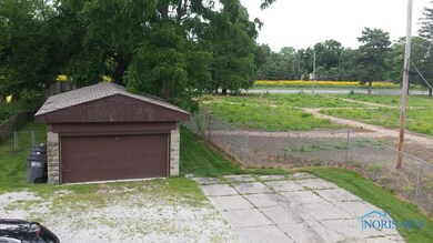Garage - Land at right is owned by the Toledo Zoo