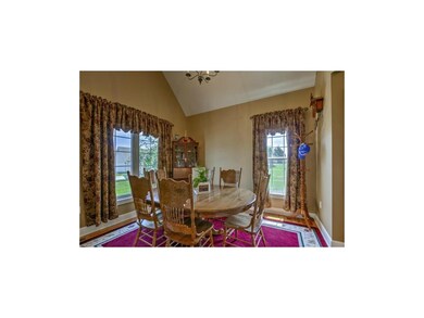 Formal dining room off of kitchen.