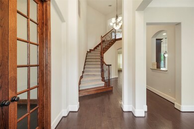 Wood Flooring as you enter the Foyer and to the left offers at Home Office and to the right is Formal Dining. No carpet downstairs.