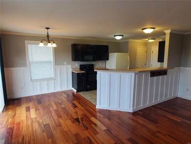 Breakfast room and kitchen with breakfast bar. All kitchen appliance included.