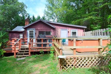 Back of the House with Deck and Hot Tub