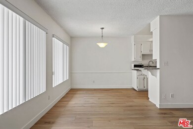 11933 Darlington Ave unit 8, Los Angeles, CA 90049 - photo 5
