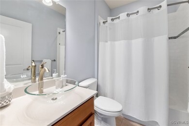 Full bath featuring tile patterned floors, vanity,