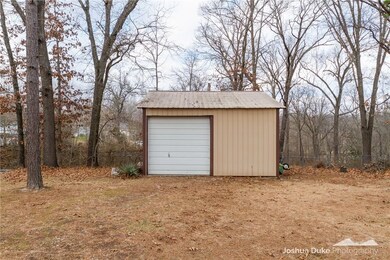 20x20 shop with roll up door provides a great area