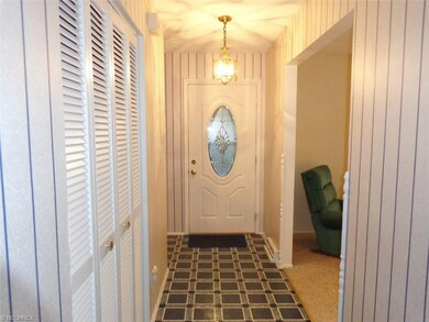 Entering into the foyer.  The formal living room i
