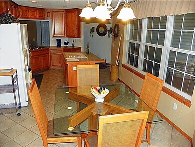 This is a glance into the 'not too small kitchen' from the Utility room.  Access to the Dining Room and Living room off to the left side of this photo.