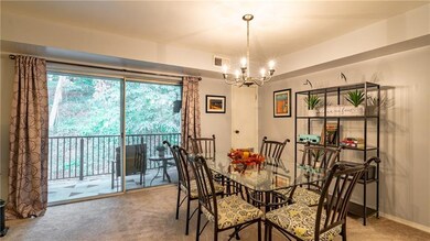 Large sliding doors open to patio area.