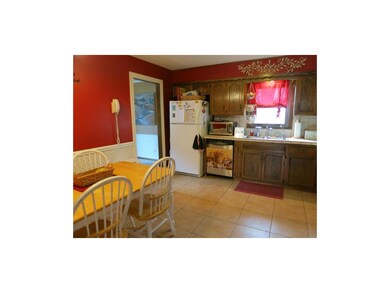 Full tile backsplash, wall oven, smooth surface co