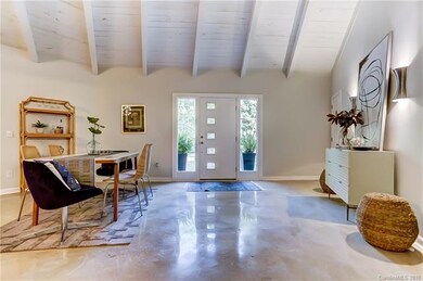 Concrete stained polished floors. High ceilings wi