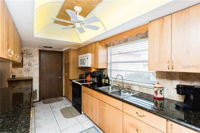Kitchen with granite counter tops