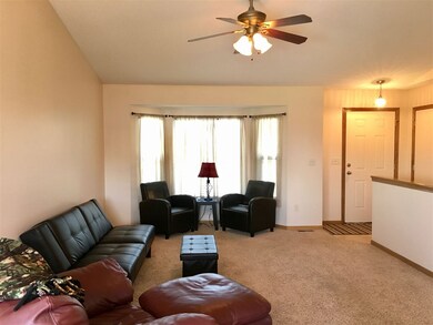 Looking from Dining Area to Bay window and front e