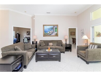 Living space with volume ceilings and crown mouldi