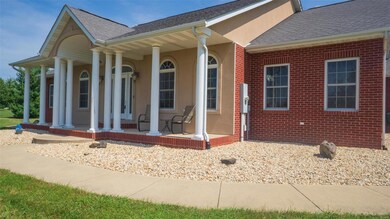 Large covered patio with pillars