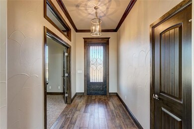 Rich wood tones and in the crown molding and trim 