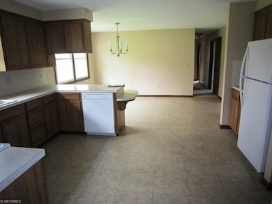 Fully applianced kitchen and dinette area with new
