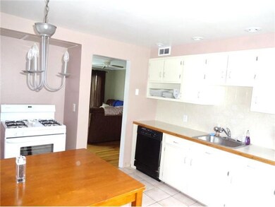 Kitchen New light fixtures, freshly painted rooms, all ceramic floors and hardwood throughout!