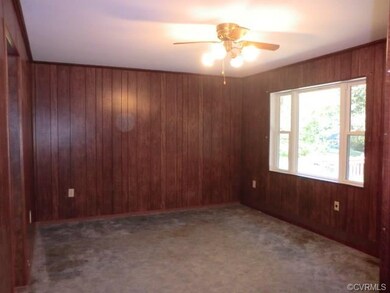 Spacious Living Room w/Wood Floor Under Carpet